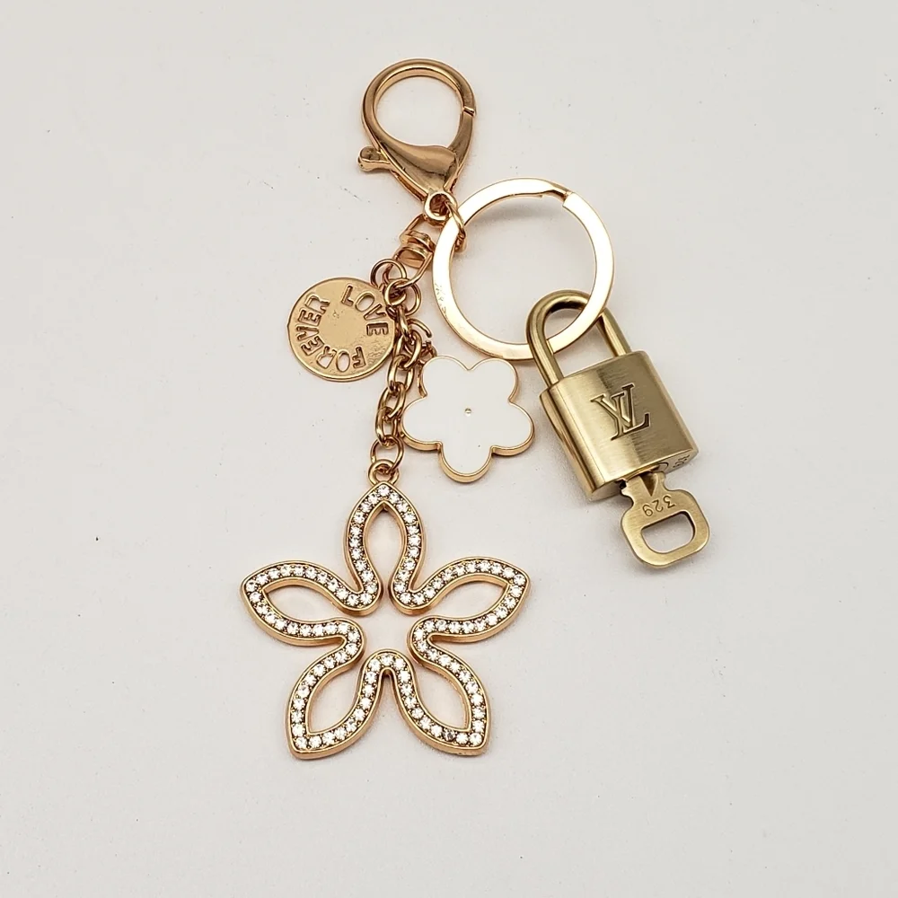 Authentic Louis Vuitton Gold Lock & Key 🔑 Bag Charm w/ Unbranded Clover Charm